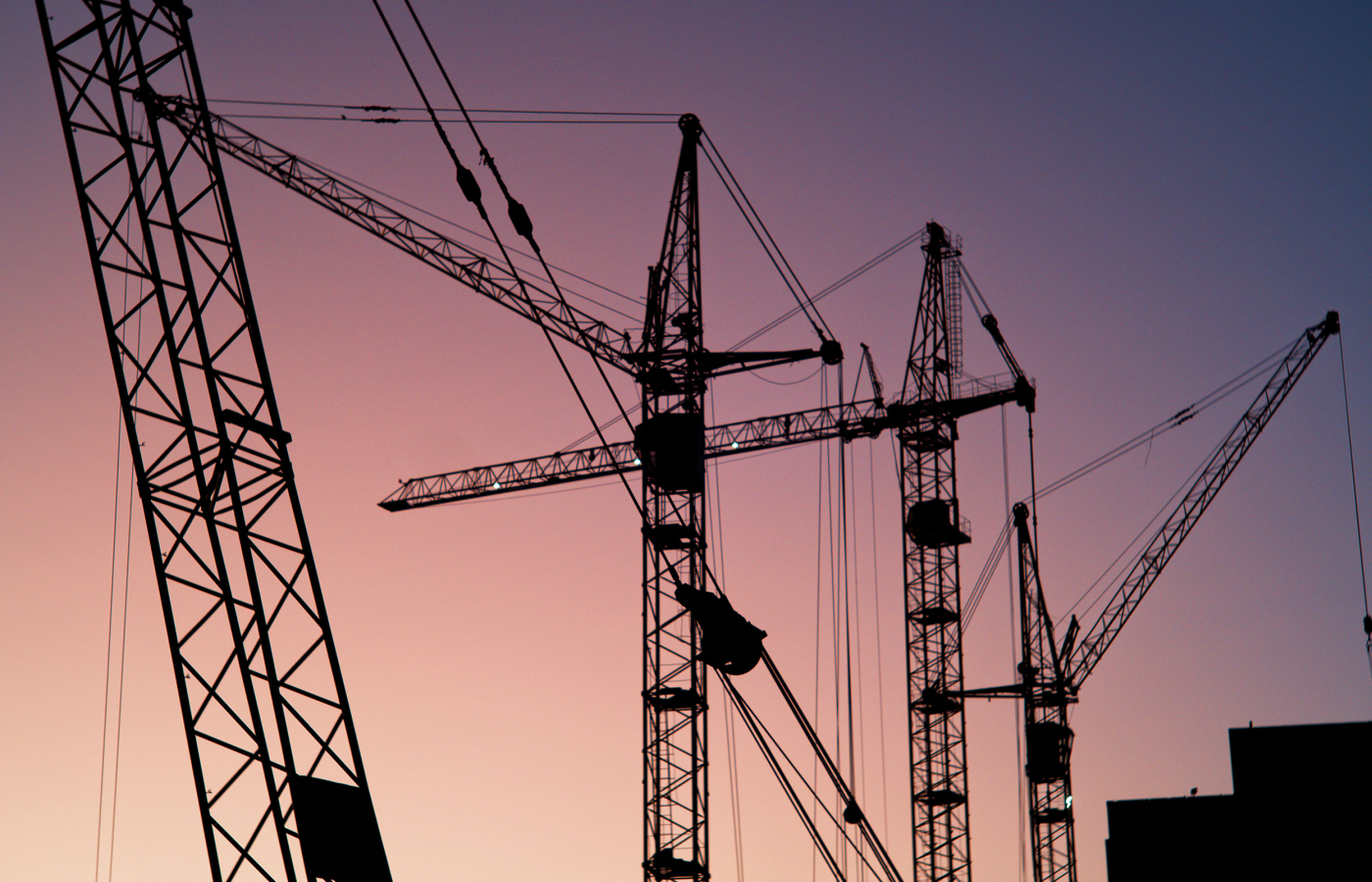 Cranes on skyline
